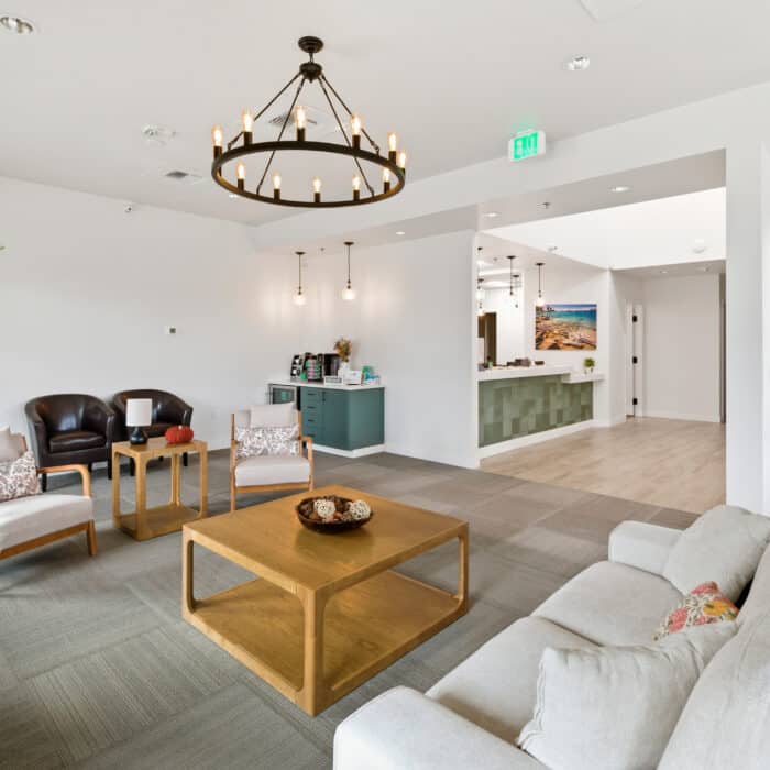 Waiting area with a coffee table and sofas