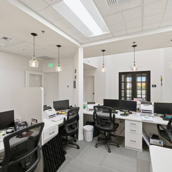 Staff workstations behind the front desk