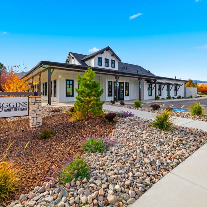The office with the Kiggins sign and landscaping