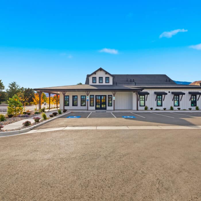 Front of the office seen across the parking lot