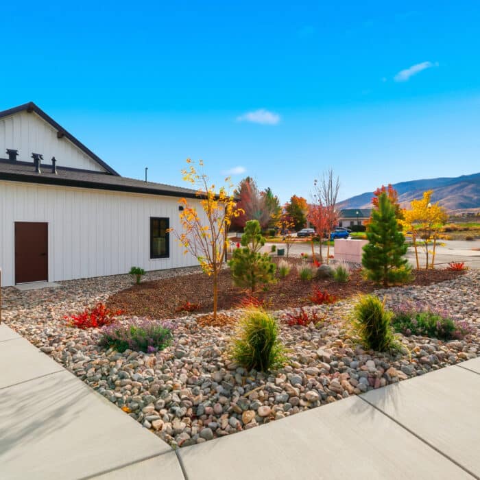 Corner of the office building with landscaped plantings