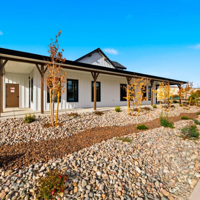 Side view of the office with its landscaped rock garden